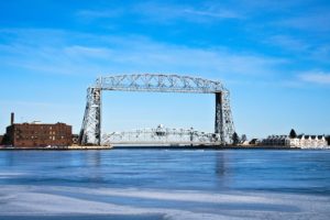 Aerial lift bridge on sunny day Canal Park Duluth